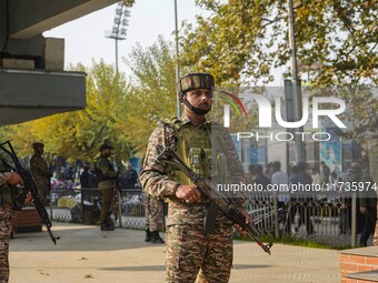 Indian security personnel stand near the site of a grenade blast at a marketplace in Srinagar, Jammu and Kashmir, on November 3, 2024. At le...