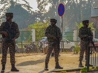 Indian security personnel stand near the site of a grenade blast at a marketplace in Srinagar, Jammu and Kashmir, on November 3, 2024. At le...