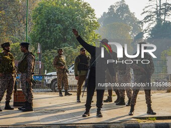 Indian security personnel stand near the site of a grenade blast at a marketplace in Srinagar, Jammu and Kashmir, on November 3, 2024. At le...