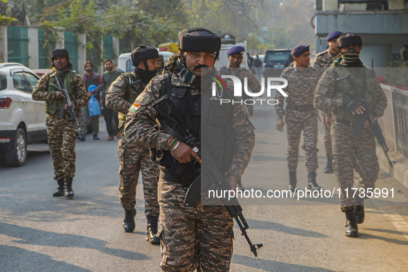 Indian security personnel inspect the site of a grenade blast at a marketplace in Srinagar, Jammu and Kashmir, on November 3, 2024. At least...