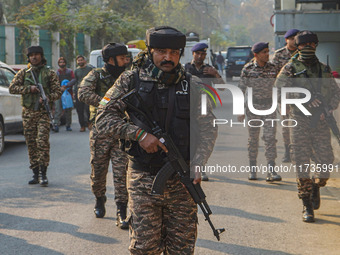 Indian security personnel inspect the site of a grenade blast at a marketplace in Srinagar, Jammu and Kashmir, on November 3, 2024. At least...