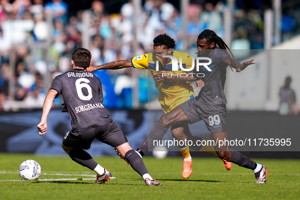 Andre-Frank Zambo Anguissa of SSC Napoli and Ederson of Atalanta BC compete for the ball during the serie Serie A Enilive match between SSC...