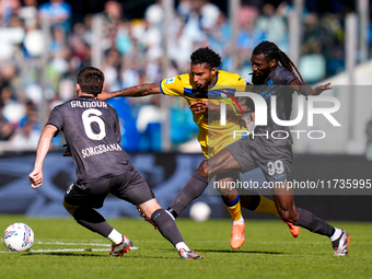 Andre-Frank Zambo Anguissa of SSC Napoli and Ederson of Atalanta BC compete for the ball during the serie Serie A Enilive match between SSC...