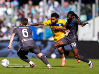 Andre-Frank Zambo Anguissa of SSC Napoli and Ederson of Atalanta BC compete for the ball during the serie Serie A Enilive match between SSC...