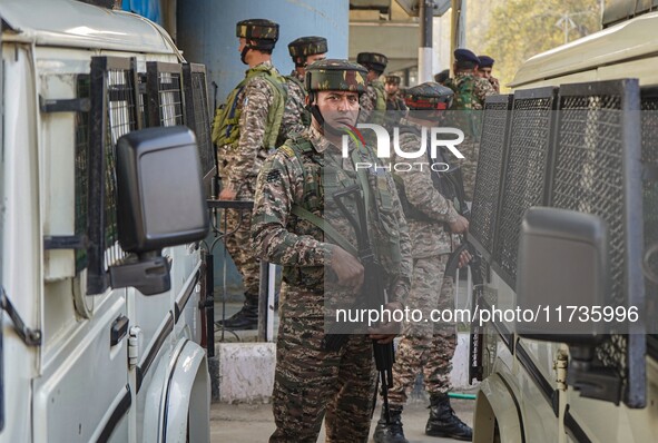 An Indian security personnel stands near the site of a grenade blast at a marketplace in Srinagar, Jammu and Kashmir, on November 3, 2024. A...