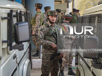 An Indian security personnel stands near the site of a grenade blast at a marketplace in Srinagar, Jammu and Kashmir, on November 3, 2024. A...