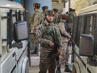 An Indian security personnel stands near the site of a grenade blast at a marketplace in Srinagar, Jammu and Kashmir, on November 3, 2024. A...