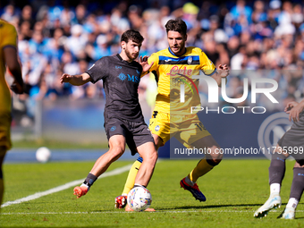 Berat Djimsiti of Atalanta BC and Khvicha Kvaratskhelia of SSC Napoli compete for the ball during the serie Serie A Enilive match between SS...