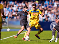 Berat Djimsiti of Atalanta BC and Khvicha Kvaratskhelia of SSC Napoli compete for the ball during the serie Serie A Enilive match between SS...