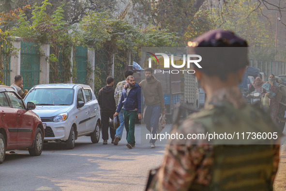 An Indian security personnel stands near the site of a grenade blast at a marketplace in Srinagar, Jammu and Kashmir, on November 3, 2024. A...