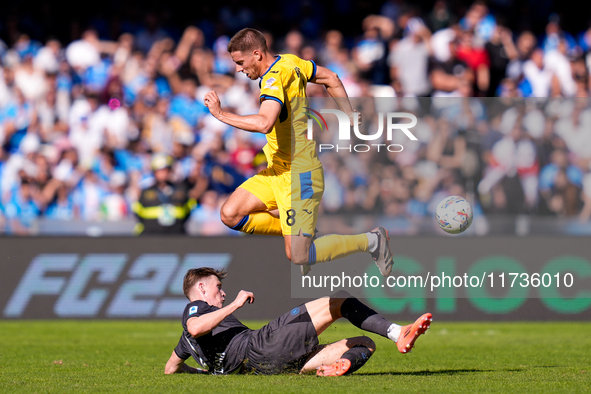 Mario Pasalic of Atalanta BC and Scott McTominay of SSC Napoli compete for the ball during the serie Serie A Enilive match between SSC Napol...