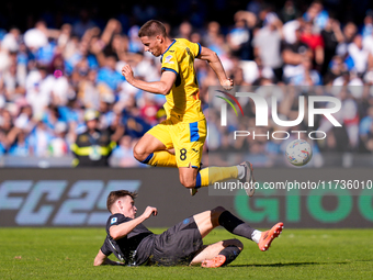 Mario Pasalic of Atalanta BC and Scott McTominay of SSC Napoli compete for the ball during the serie Serie A Enilive match between SSC Napol...