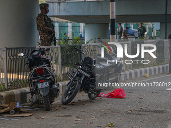 An Indian security personnel stands near the site of a grenade blast at a marketplace in Srinagar, Jammu and Kashmir, on November 3, 2024. A...