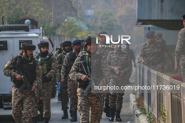 Indian security personnel inspect the site of a grenade blast at a marketplace in Srinagar, Jammu and Kashmir, on November 3, 2024. At least...