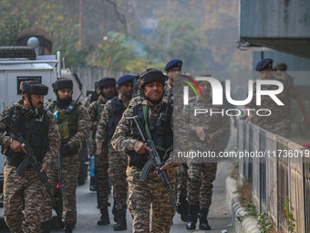 Indian security personnel inspect the site of a grenade blast at a marketplace in Srinagar, Jammu and Kashmir, on November 3, 2024. At least...