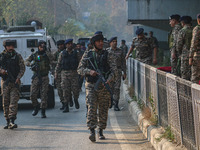 Indian security personnel inspect the site of a grenade blast at a marketplace in Srinagar, Jammu and Kashmir, on November 3, 2024. At least...