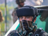 An Indian security personnel stands near the site of a grenade blast at a marketplace in Srinagar, Jammu and Kashmir, on November 3, 2024. A...