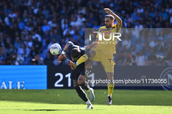 Mathias Olivera of S.S.C. Napoli and Davide Zappacosta of Atalanta B.C. are in action during the 11th day of the Serie A Championship betwee...