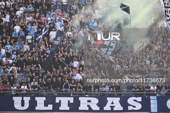 Supporters of S.S.C. Napoli attend the 11th day of the Serie A Championship between S.S.C. Napoli and Atalanta B.C. at the Diego Armando Mar...