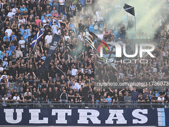 Supporters of S.S.C. Napoli attend the 11th day of the Serie A Championship between S.S.C. Napoli and Atalanta B.C. at the Diego Armando Mar...