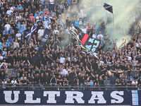 Supporters of S.S.C. Napoli attend the 11th day of the Serie A Championship between S.S.C. Napoli and Atalanta B.C. at the Diego Armando Mar...