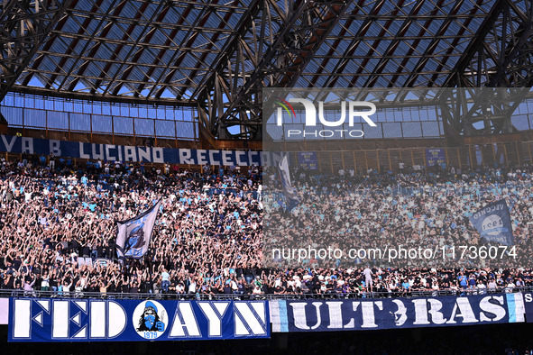 Supporters of S.S.C. Napoli attend the 11th day of the Serie A Championship between S.S.C. Napoli and Atalanta B.C. at the Diego Armando Mar...