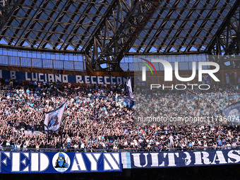 Supporters of S.S.C. Napoli attend the 11th day of the Serie A Championship between S.S.C. Napoli and Atalanta B.C. at the Diego Armando Mar...