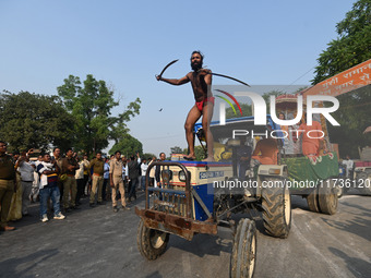 Indian Sadhus of Juna Akhara take part in a religious procession during the grand Nagar Pravesh ceremony for the upcoming Maha Kumbh Mela fe...