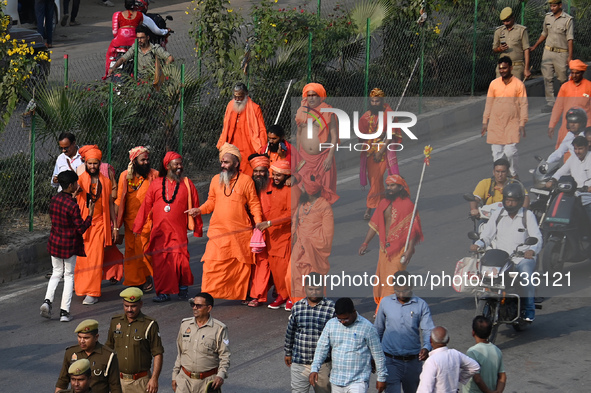 Indian Sadhus of Juna Akhara take part in a religious procession during the grand Nagar Pravesh ceremony for the upcoming Maha Kumbh Mela fe...