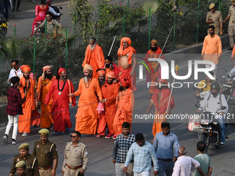 Indian Sadhus of Juna Akhara take part in a religious procession during the grand Nagar Pravesh ceremony for the upcoming Maha Kumbh Mela fe...