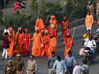 Indian Sadhus of Juna Akhara take part in a religious procession during the grand Nagar Pravesh ceremony for the upcoming Maha Kumbh Mela fe...