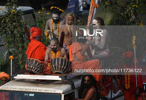 Indian Sadhus of Juna Akhara take part in a religious procession during the grand Nagar Pravesh ceremony for the upcoming Maha Kumbh Mela fe...