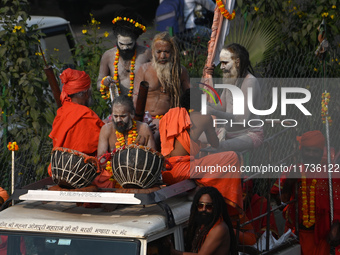 Indian Sadhus of Juna Akhara take part in a religious procession during the grand Nagar Pravesh ceremony for the upcoming Maha Kumbh Mela fe...