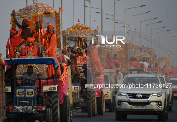 Indian Sadhus of Juna Akhara take part in a religious procession during the grand Nagar Pravesh ceremony for the upcoming Maha Kumbh Mela fe...