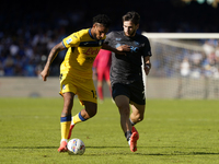 Ederson of Atalanta BC competes for the ball with Khvicha Kvaratskhelia of SSC Napoli during the Serie A match between SSC Napoli and Atalan...