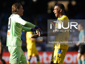 Marco Carnesecchi and Isak Hien of Atalanta BC celebrate at the end of the Serie A match between SSC Napoli and Atalanta BC at Stadio Diego...