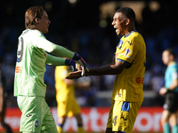 Marco Carnesecchi and Isak Hien of Atalanta BC celebrate at the end of the Serie A match between SSC Napoli and Atalanta BC at Stadio Diego...