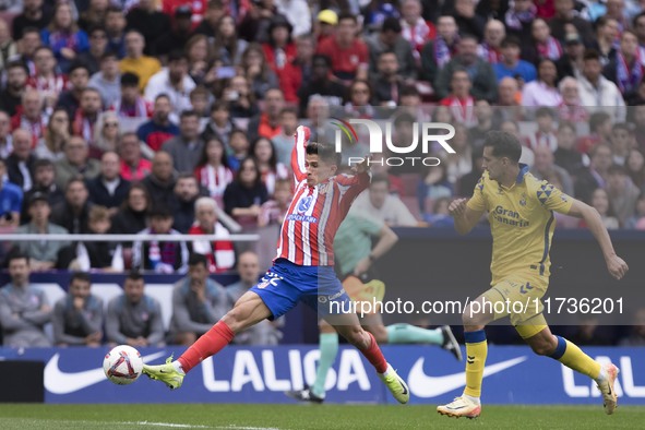 Giuliano Simeone of Atletico de Madrid controls the ball during the La Liga 2024/25 match between Atletico de Madrid and Las Palmas at Riyad...