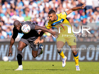 Isak Hien of Atalanta BC and Romelu Lukaku of SSC Napoli compete for the ball during the serie Serie A Enilive match between SSC Napoli and...