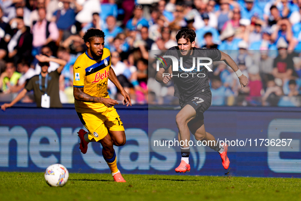 Khvicha Kvaratskhelia of SSC Napoli and Ederson of Atalanta BC compete for the ball during the serie Serie A Enilive match between SSC Napol...