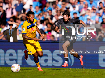 Khvicha Kvaratskhelia of SSC Napoli and Ederson of Atalanta BC compete for the ball during the serie Serie A Enilive match between SSC Napol...