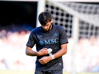 Khvicha Kvaratskhelia of SSC Napoli leaves the pitch dejected during the serie Serie A Enilive match between SSC Napoli and Atalanta BC at S...