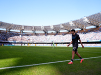 Khvicha Kvaratskhelia of SSC Napoli leaves the pitch dejected during the serie Serie A Enilive match between SSC Napoli and Atalanta BC at S...