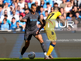 Leonardo Spinazzola of SSC Napoli and Davide Zappacosta of Atalanta BC compete for the ball during the serie Serie A Enilive match between S...