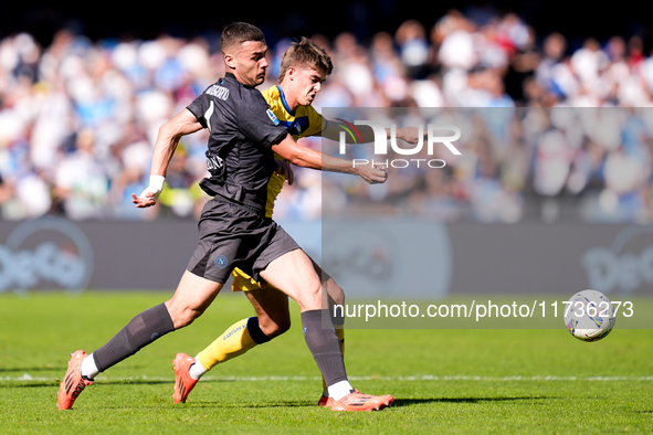 Charles De Ketelaere of Atalanta BC and Alessandro Buongiorno of SSC Napoli compete for the ball during the serie Serie A Enilive match betw...