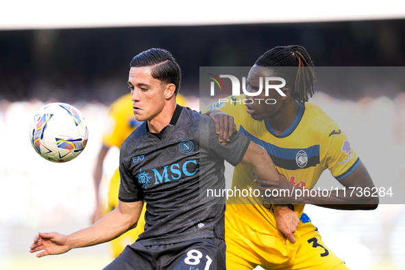 Giacomo Raspadori of SSC Napoli and Odilon Kossounou of Atalanta BC compete for the ball during the serie Serie A Enilive match between SSC...