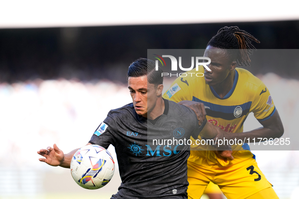 Giacomo Raspadori of SSC Napoli and Odilon Kossounou of Atalanta BC compete for the ball during the serie Serie A Enilive match between SSC...