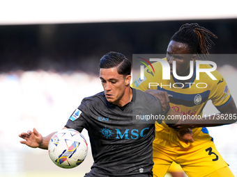 Giacomo Raspadori of SSC Napoli and Odilon Kossounou of Atalanta BC compete for the ball during the serie Serie A Enilive match between SSC...