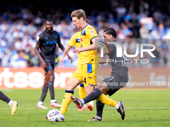 Marco Brescianini of Atalanta BC and Giacomo Raspadori of SSC Napoli compete for the ball during the serie Serie A Enilive match between SSC...