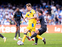 Marco Brescianini of Atalanta BC and Giacomo Raspadori of SSC Napoli compete for the ball during the serie Serie A Enilive match between SSC...